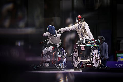 Paris Paralympics 2024: Italy's Beatrice Maria Vio Grandis, left, and South Korea's Cho Sun Eye compete in women's foil wheelchair fencing bronze medal match